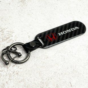 Автомобільний брелок Honda карбонова пластина Carbon (Original) 123538 фото
